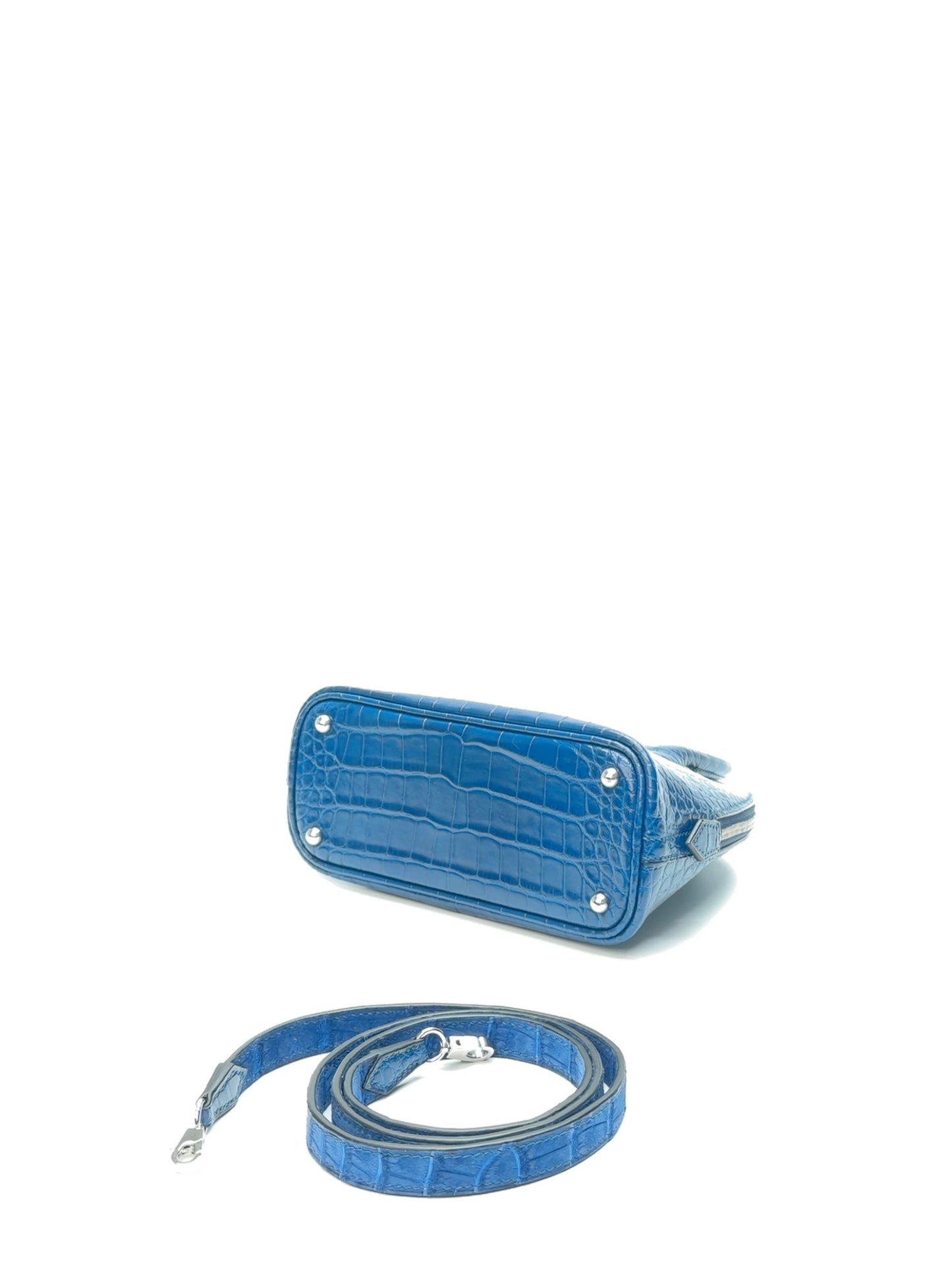 Bottom side view of zipper opening on mini dome leather bag