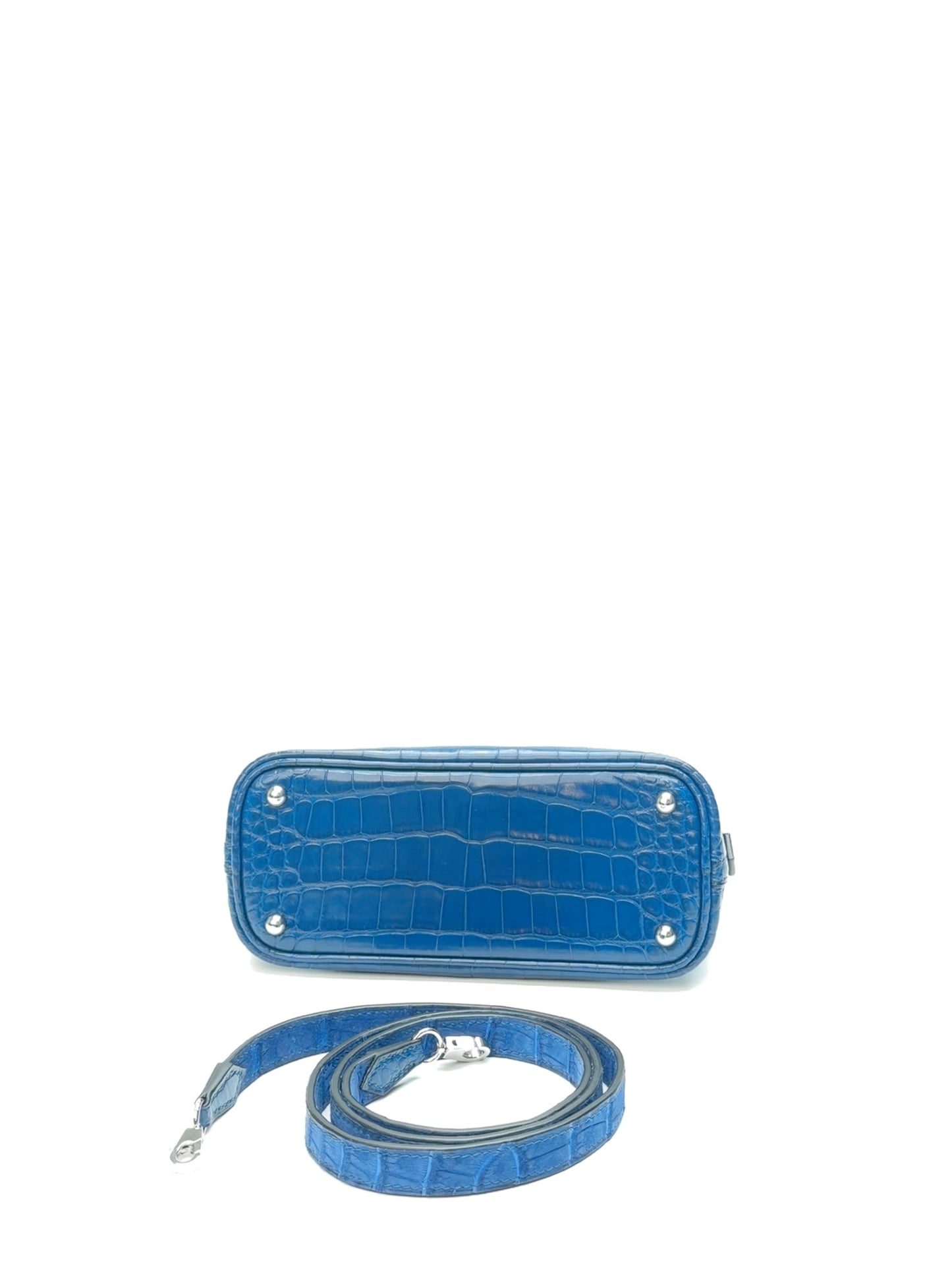 Bottom view of zipper opening on mini dome leather bag