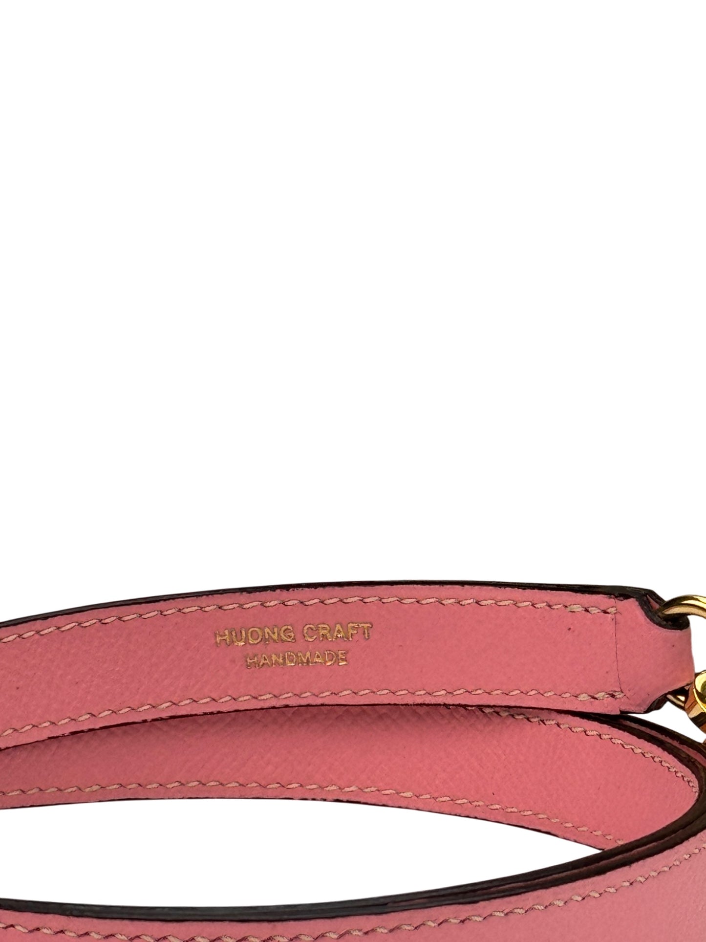 HuongCraft handmade stamp on structured leather bag strap