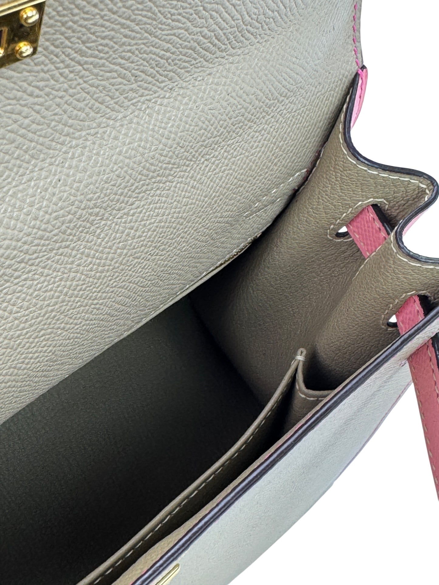 Inside pocket view of structured leather handbag sample