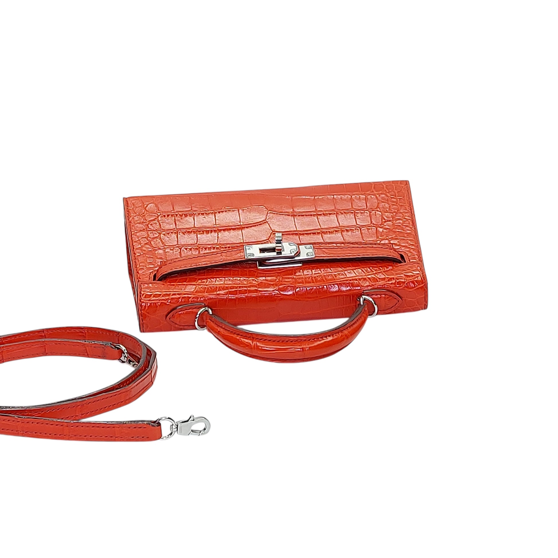 mini trapezoid top handle bag flap detail