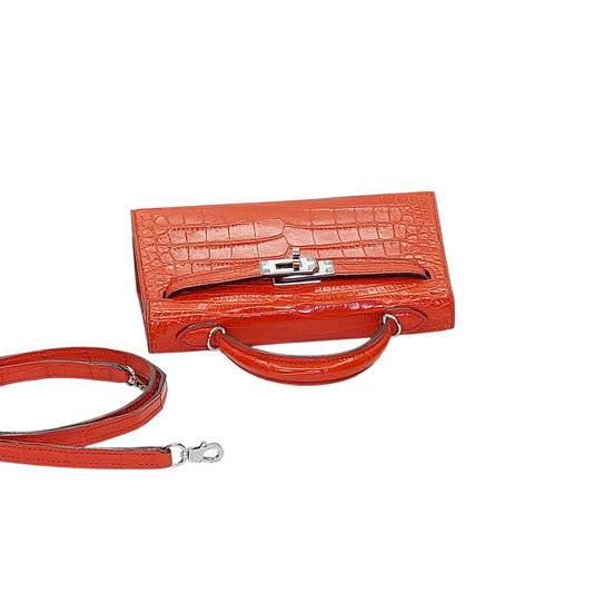mini trapezoid top handle bag flap detail