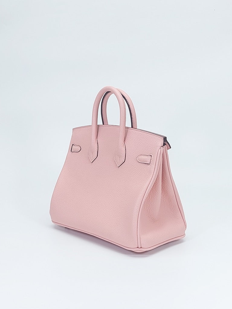Back side view of structured 25 cm leather handbag sample