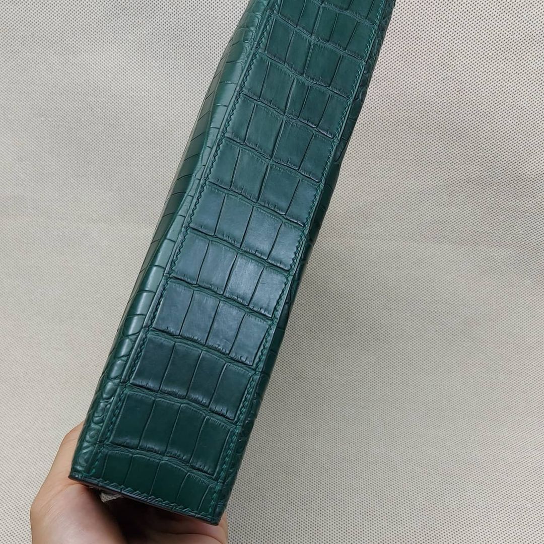 Crocodile leather scale detail in Cyprus color
