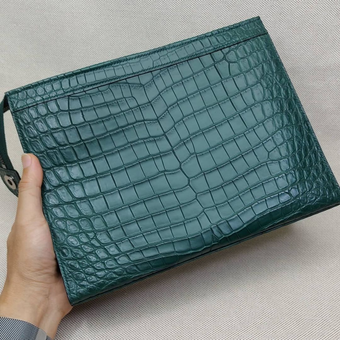 Front view of Cyprus 27 crocodile zip pouch